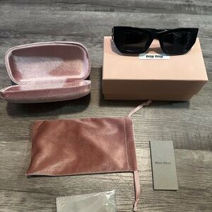 Miu Miu Black Sunglasses with Pink Velvet Case
MU09WS